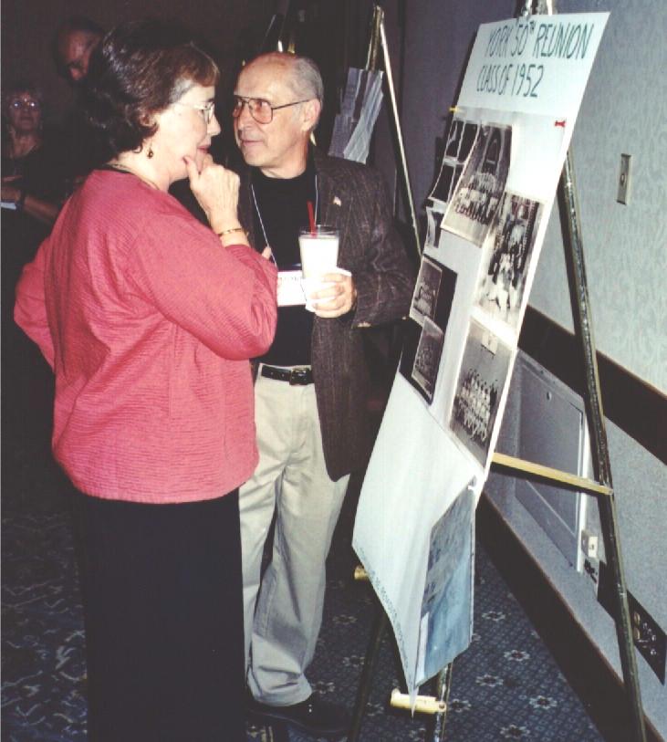 Betty (Bright) Serfling studying bulletin board