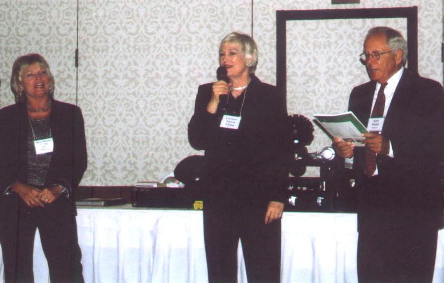 Carolyne (center) telling what song she will sing 