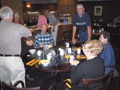 Wayne (sitting) with Carroll and Pat (standing)